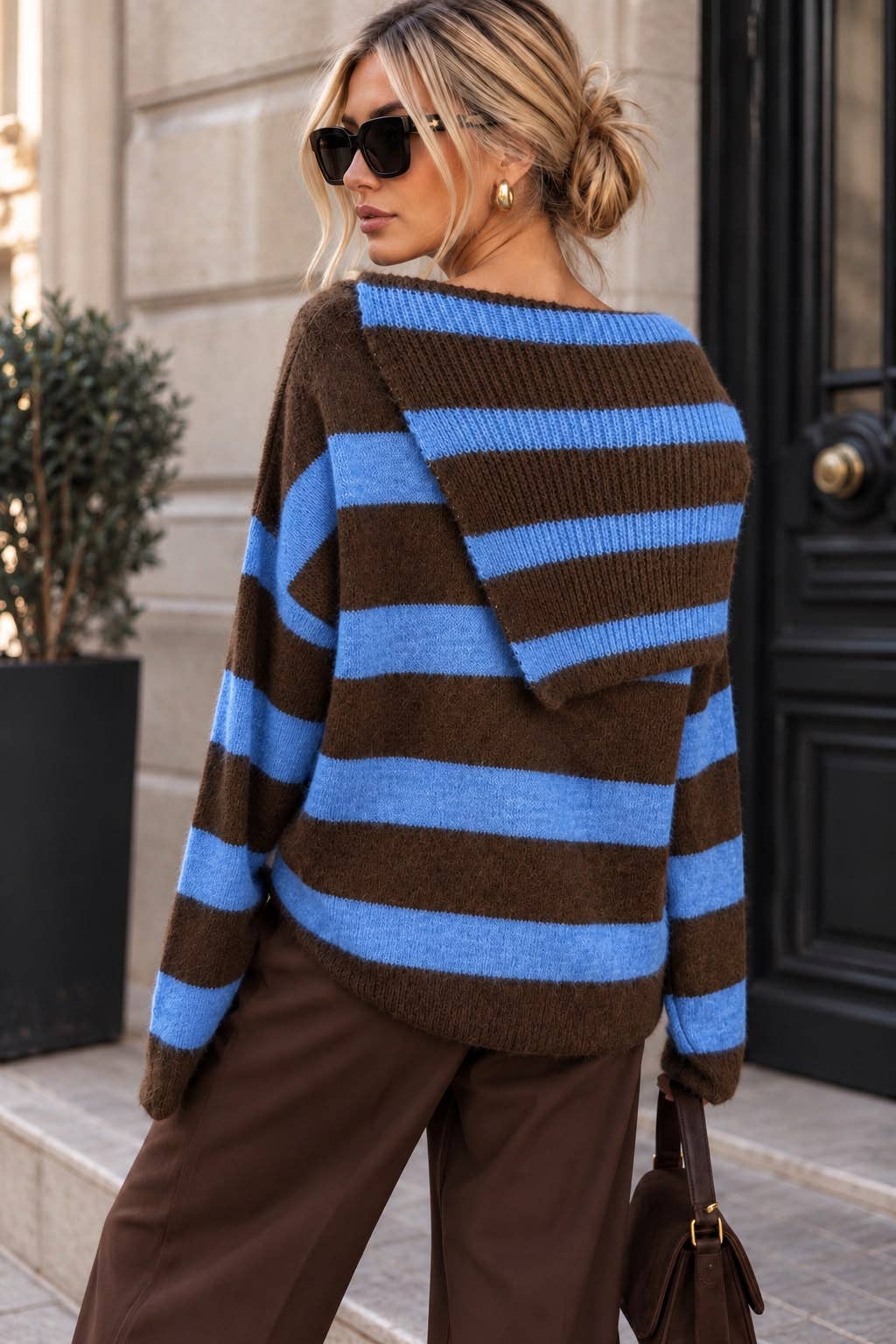 Striped knit sweater with buttoned asymmetric neckline