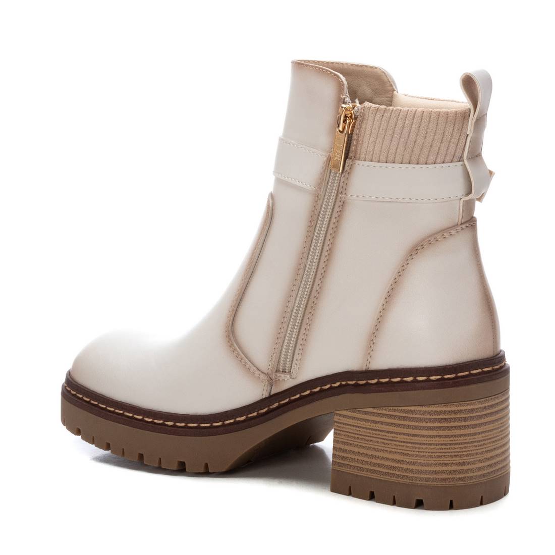 Creamy beige boot with knit and buckle detail