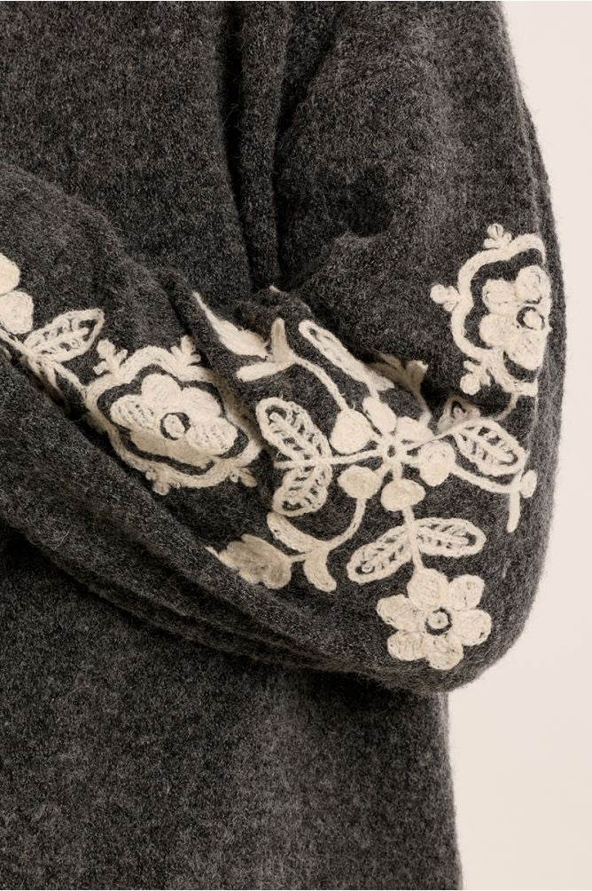 Knitted sweater in grey with cream embroidery