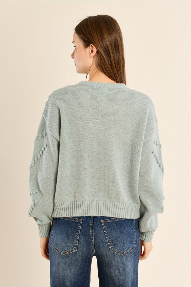 Pale turquoise sweater with sequence