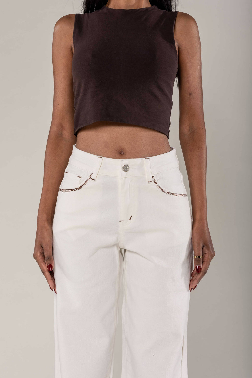 Wide stretch cream jeans with topstitching