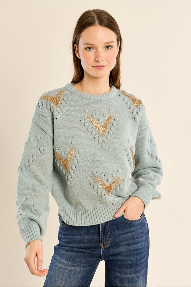 Pale turquoise sweater with sequence