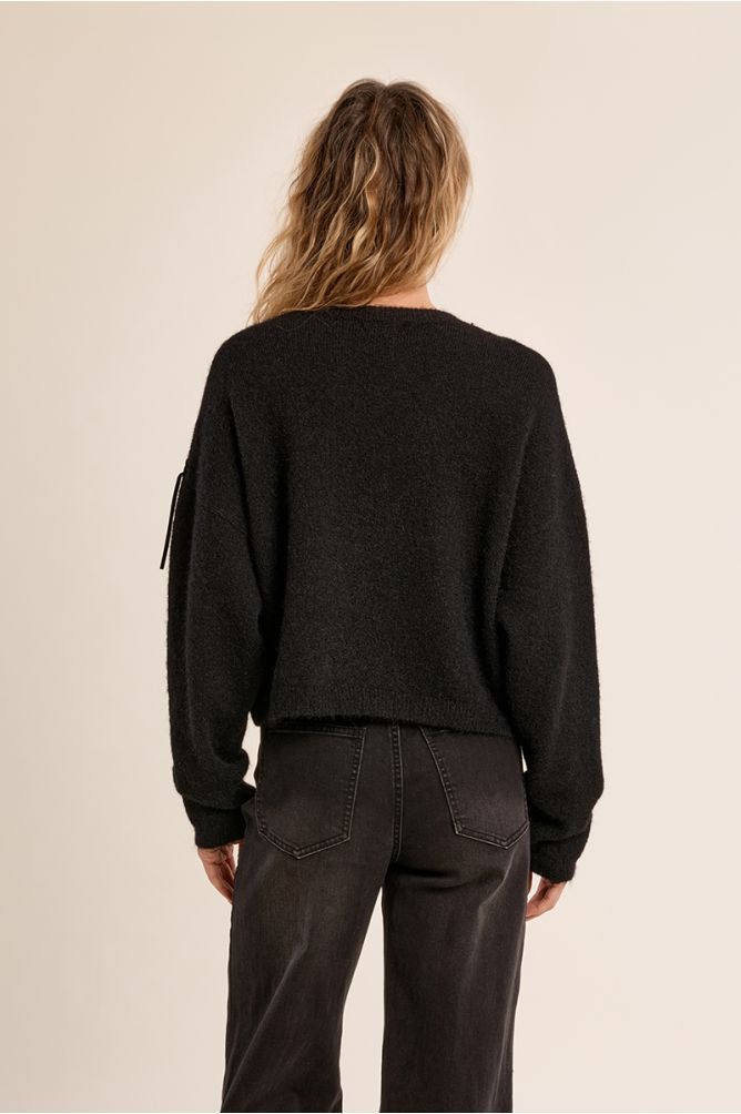 Fringed sweater with rhinestone in black