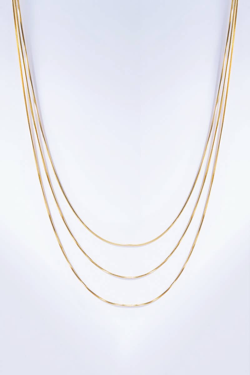 Stainless steel triple fine necklace: Yellow gold