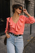 Pink gingham blouse with ruffles: ORANGE