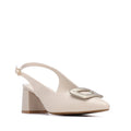 Heeled cream show with subtle gold buckle