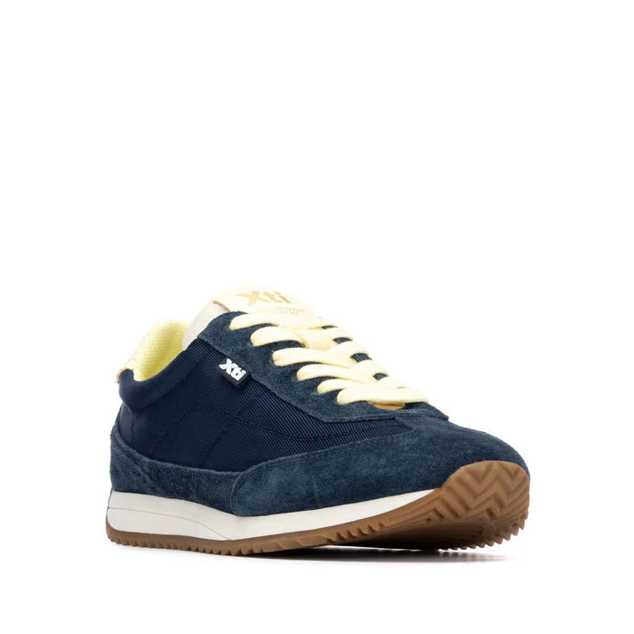 Navy and pale yellow trainer