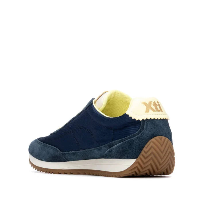 Navy and pale yellow trainer