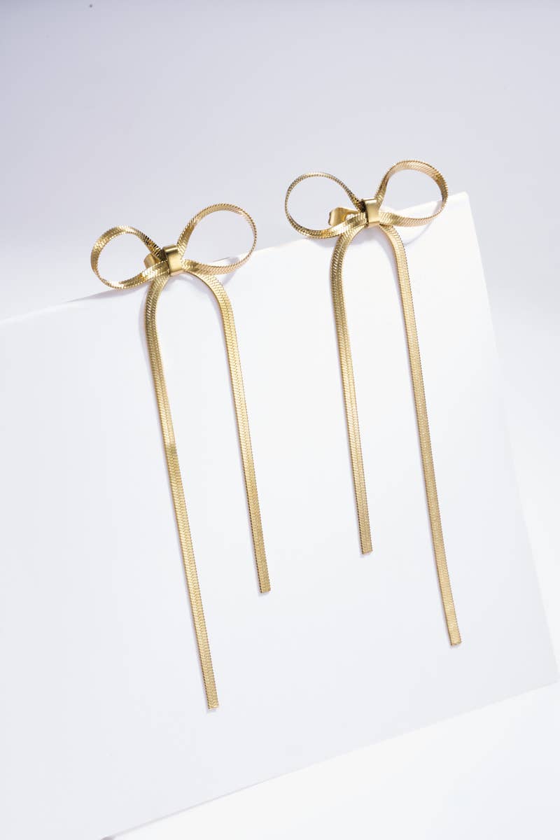 Stainless steel bow tie earrings: Yellow gold
