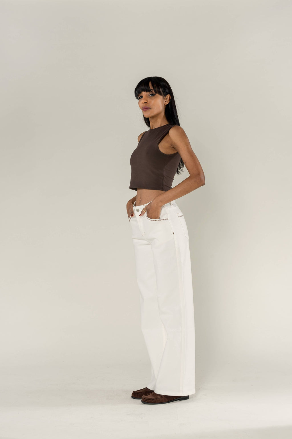 Wide stretch cream jeans with topstitching